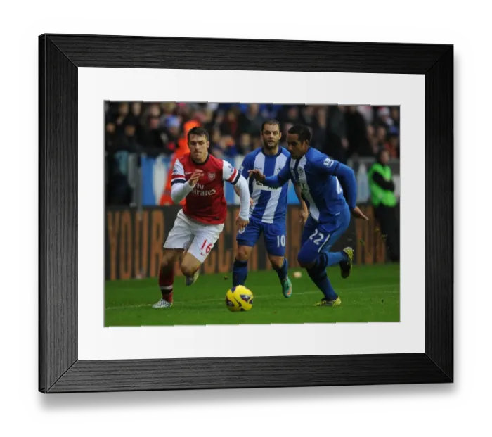 Framed Print : Clash of Champions: Ramsey vs. Beausejour - Wigan Athletic vs. Arsenal, Premier League, 2012