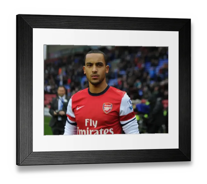 Framed Print : Theo Walcott's Determination: Arsenal's Preparation for Wigan Athletic Clash (2012-13) Framed Print : Theo Walcott's Determination: Arsenal's Preparation for Wigan Athletic Clash (2012-13)