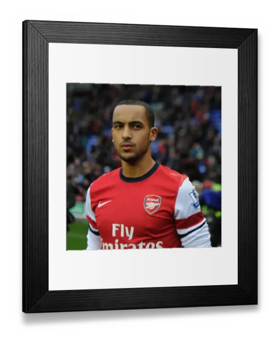 Framed Print : Theo Walcott's Readiness: Arsenal's Preparation for Wigan Athletic (2012-13) Framed Print : Theo Walcott's Readiness: Arsenal's Preparation for Wigan Athletic (2012-13)