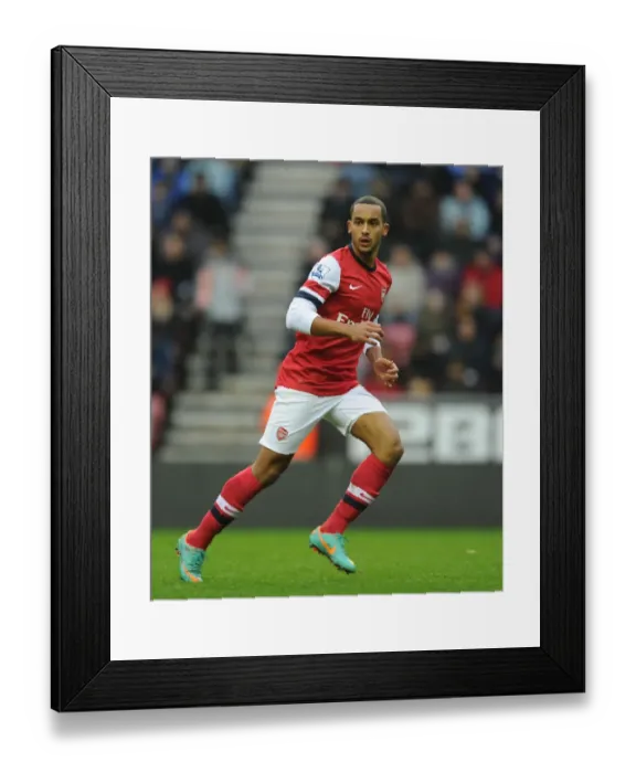 Framed Print : Theo Walcott in Action: Wigan Athletic vs. Arsenal, Premier League 2012-13