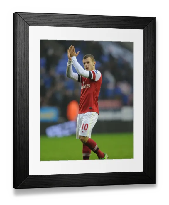Framed Print : Arsenal's Jack Wilshere Applauding Fans after Wigan Victory (2012-13) Framed Print : Arsenal's Jack Wilshere Applauding Fans after Wigan Victory (2012-13)