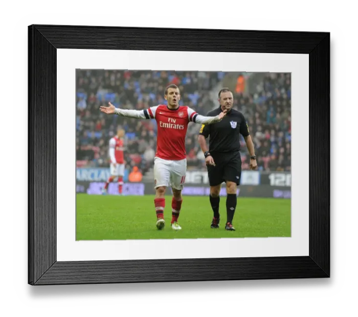 Framed Print : Wilshere and Referee Clash: Wigan Athletic vs. Arsenal, Premier League 2012-13
