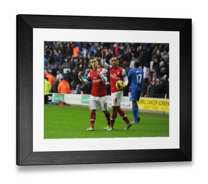 Framed Print : Arsenal Celebrate Victory Over Wigan Athletic in Premier League Showdown (2012-13)
