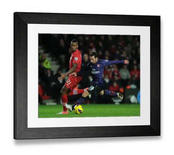 Framed Print : Santi Cazorla vs Guly Do Prado: Shielding the Ball in the Southampton v Arsenal Clash (2012-13) Framed Print : Santi Cazorla vs Guly Do Prado: Shielding the Ball in the Southampton v Arsenal Clash (2012-13)