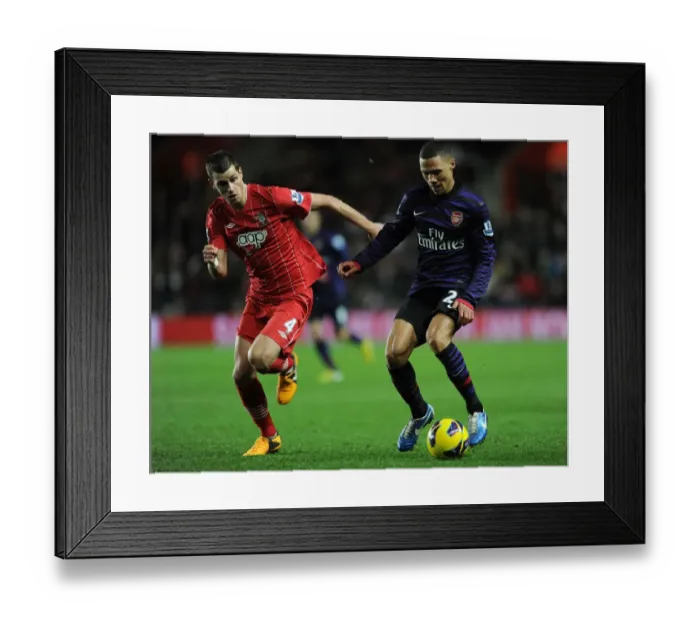 Framed Print : Clash at St. Mary's: Kieran Gibbs vs. Morgan Schneiderlin (Southampton v Arsenal, 2012-13) Framed Print : Clash at St. Mary's: Kieran Gibbs vs. Morgan Schneiderlin (Southampton v Arsenal, 2012-13)