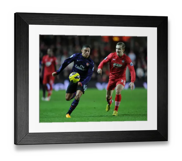 Framed Print : Clash of Young Talents: Oxlade-Chamberlain vs Shaw, Southampton vs Arsenal, Premier League 2012-13