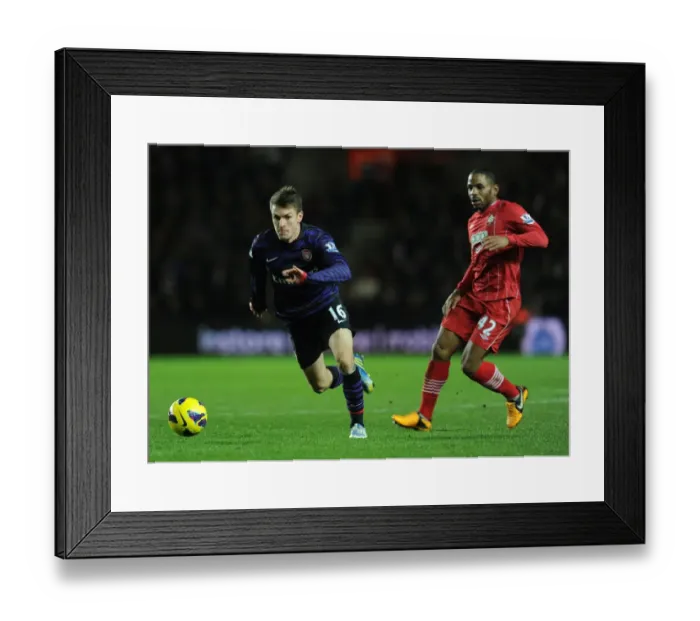 Framed Print : Ramsey Outruns Puncheon: Southampton vs. Arsenal, Premier League, 2012-13 Framed Print : Ramsey Outruns Puncheon: Southampton vs. Arsenal, Premier League, 2012-13