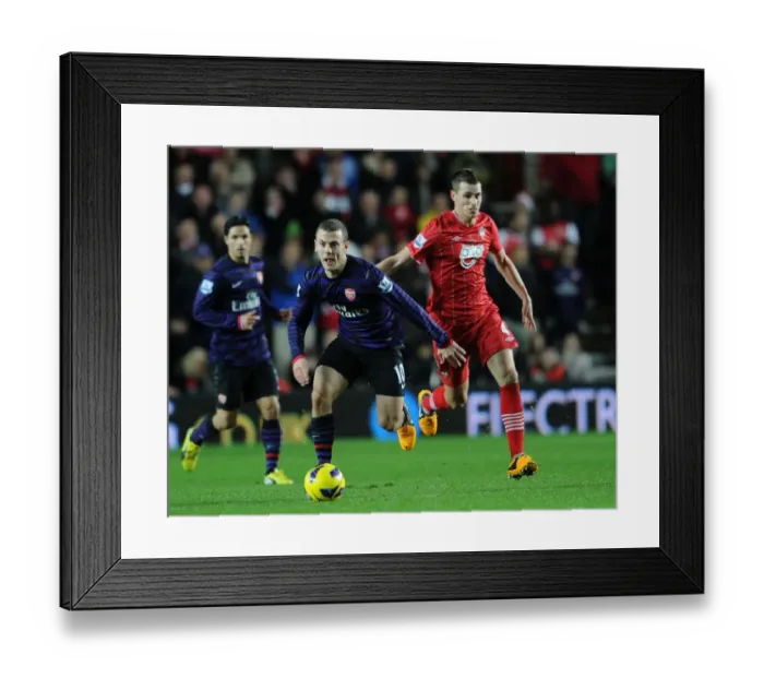 Framed Print : Jack Wilshere vs Morgan Schneiderlin: Intense Battle in Southampton v Arsenal (2012-13)