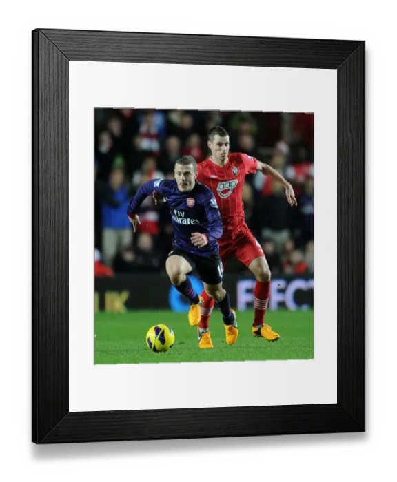 Framed Print : Intense Rivalry: Jack Wilshere vs Morgan Schneiderlin, Southampton vs Arsenal (2012-13) Framed Print : Intense Rivalry: Jack Wilshere vs Morgan Schneiderlin, Southampton vs Arsenal (2012-13)