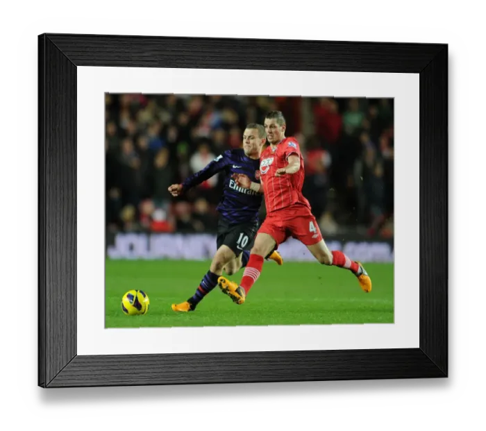Framed Print : Intense Rivalry: Wilshere vs Schneiderlin - Southampton vs Arsenal Clash (2013)