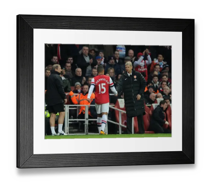 Framed Print : Arsene Wenger the Arsenal Manager shakes hands with Alex Oxlade-Chamberlain (Arsenal) Framed Print : Arsene Wenger the Arsenal Manager shakes hands with Alex Oxlade-Chamberlain (Arsenal)