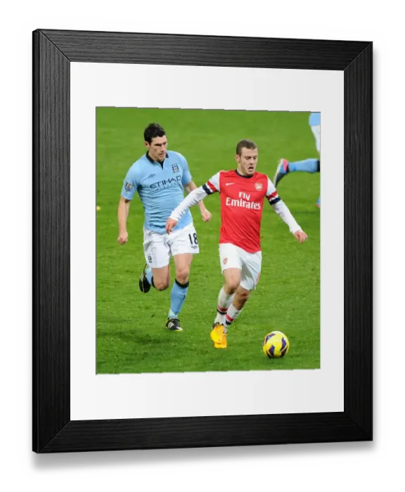 Framed Print : Jack Wilshere vs. Gareth Barry: Intense Midfield Battle at Arsenal vs. Manchester City (2012-13) Framed Print : Jack Wilshere vs. Gareth Barry: Intense Midfield Battle at Arsenal vs. Manchester City (2012-13)