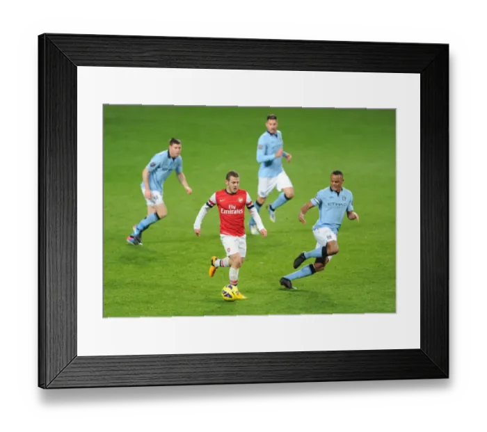 Framed Print : Arsenal's Wilshere Faces Off Against Manchester City's Midfield Trio: Milner, Garcia, and Kompany Framed Print : Arsenal's Wilshere Faces Off Against Manchester City's Midfield Trio: Milner, Garcia, and Kompany