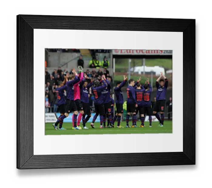 Framed Print : The Arsenal Team clap the fans before the match. Swansea 2: 2 Arsenal. FA Cup 3rd Round