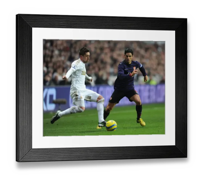 Framed Print : Mikel Arteta vs. Pablo Hernandez: Clash at the Liberty Stadium - Swansea v Arsenal, FA Cup 3rd Round Framed Print : Mikel Arteta vs. Pablo Hernandez: Clash at the Liberty Stadium - Swansea v Arsenal, FA Cup 3rd Round
