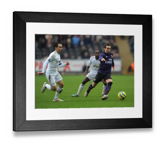 Framed Print : Santi Cazorla Outmaneuvers Leon Britton: A FA Cup Battle between Swansea and Arsenal Framed Print : Santi Cazorla Outmaneuvers Leon Britton: A FA Cup Battle between Swansea and Arsenal