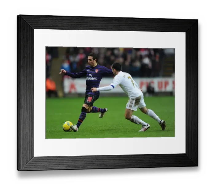 Framed Print : Santi Cazorla vs. Leon Britton: FA Cup Clash between Swansea and Arsenal Framed Print : Santi Cazorla vs. Leon Britton: FA Cup Clash between Swansea and Arsenal