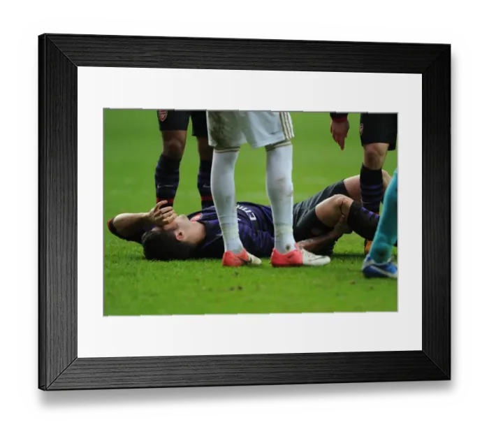 Framed Print : Arsenal's Olivier Giroud Suffers Injury in Swansea FA Cup Clash Framed Print : Arsenal's Olivier Giroud Suffers Injury in Swansea FA Cup Clash