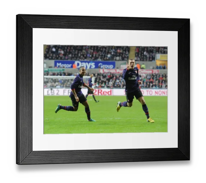 Framed Print : Podolski and Walcott Celebrate Arsenal's FA Cup Goal Against Swansea