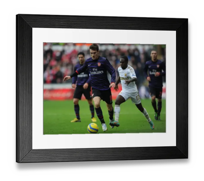 Framed Print : Aaron Ramsey vs. Nathan Dyer: FA Cup Clash at Swansea City