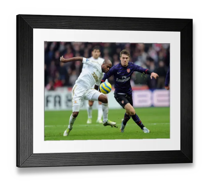 Framed Print : Aaron Ramsey Closes In: Swansea v Arsenal FA Cup Showdown