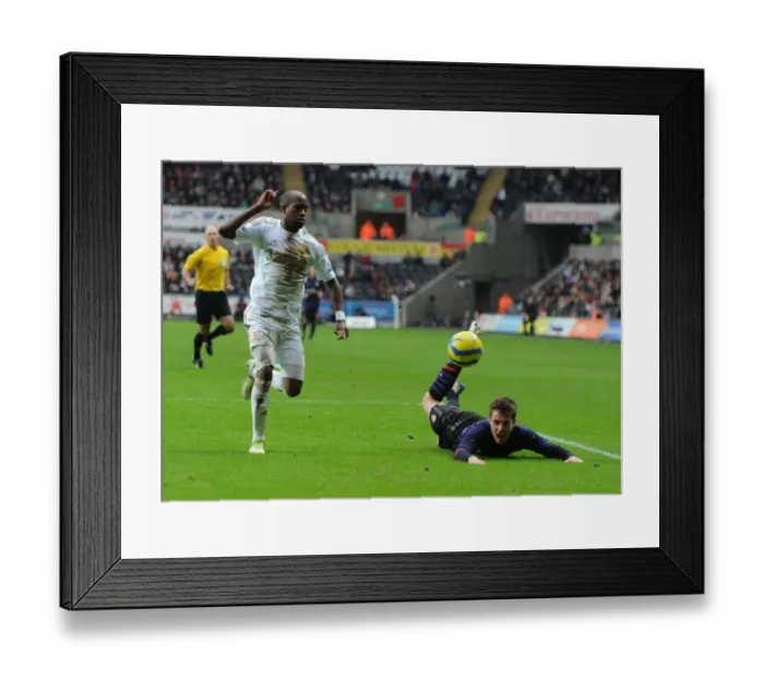 Framed Print : Ramsey vs. Tiendalli: FA Cup Battle at Swansea