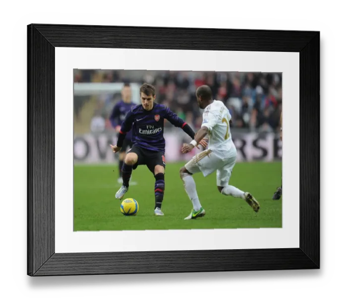 Framed Print : Clash at the Liberty: Ramsey vs. Tiendalli in the FA Cup Third Round Framed Print : Clash at the Liberty: Ramsey vs. Tiendalli in the FA Cup Third Round