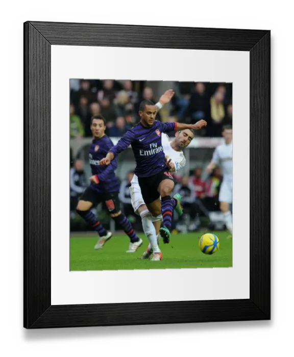 Framed Print : Theo Walcott vs Chico Flores: FA Cup Clash Between Swansea and Arsenal