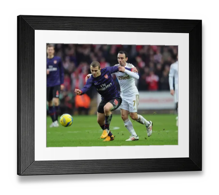 Framed Print : Jack Wilshere vs. Leon Britton: Battle at the Liberty Stadium - Swansea v Arsenal, FA Cup 3rd Round