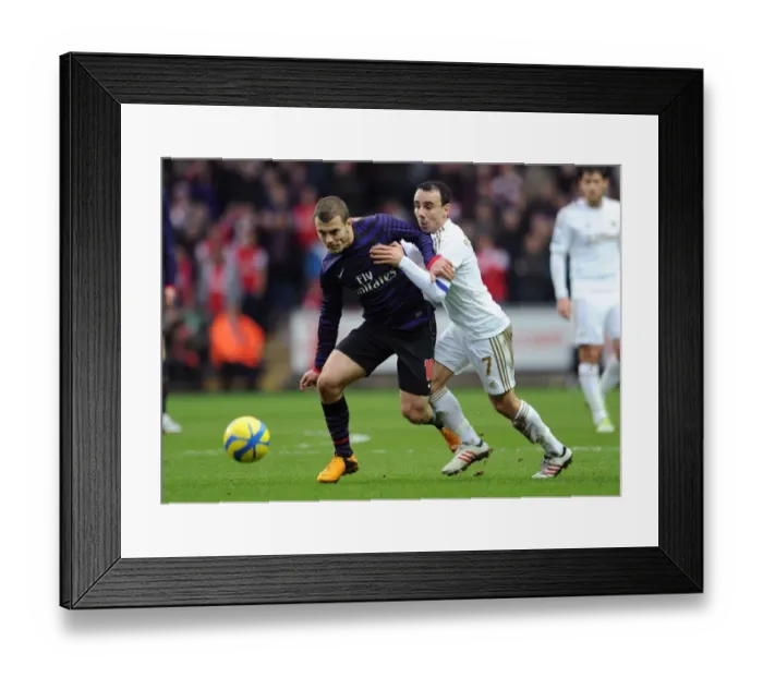 Framed Print : Battle of Midfield: Jack Wilshere vs. Leon Britton - Swansea vs. Arsenal FA Cup Clash