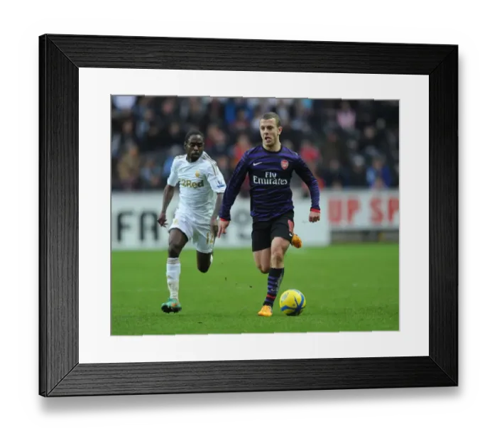 Framed Print : Jack Wilshere vs. Nathan Dyer: A Midfield Battle at Swansea FA Cup Match (Swansea vs. Arsenal 2012-13) Framed Print : Jack Wilshere vs. Nathan Dyer: A Midfield Battle at Swansea FA Cup Match (Swansea vs. Arsenal 2012-13)