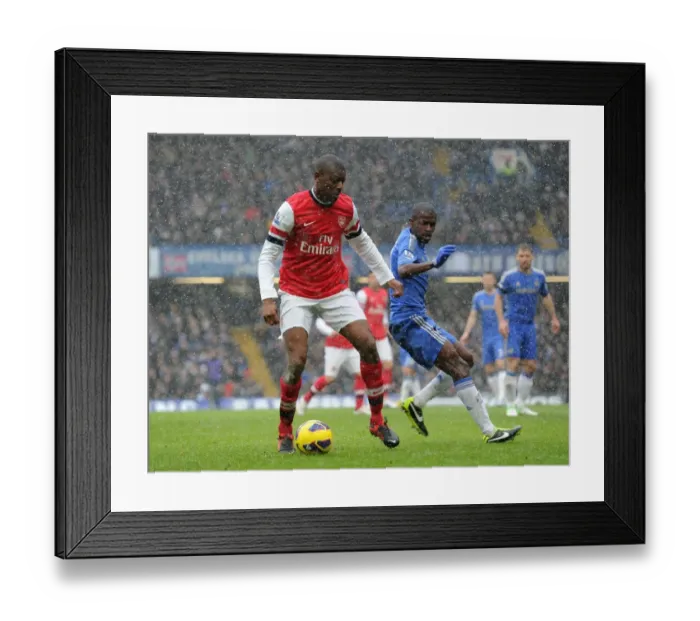 Framed Print : Abou Diaby vs. Ramires: Shielding the Ball in the Intense Rivalry of Chelsea vs. Arsenal (2012-13) Framed Print : Abou Diaby vs. Ramires: Shielding the Ball in the Intense Rivalry of Chelsea vs. Arsenal (2012-13)