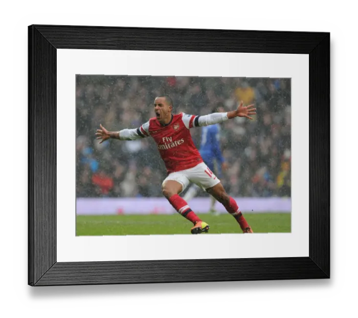 Framed Print : Theo Walcott's Thrilling Goal: A Premier League Rivalry - Chelsea vs. Arsenal (2012-13)