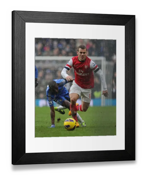 Framed Print : Jack Wilshere Surges Past Ramires: Intense Rivalry in Chelsea vs. Arsenal Premier League Clash Framed Print : Jack Wilshere Surges Past Ramires: Intense Rivalry in Chelsea vs. Arsenal Premier League Clash