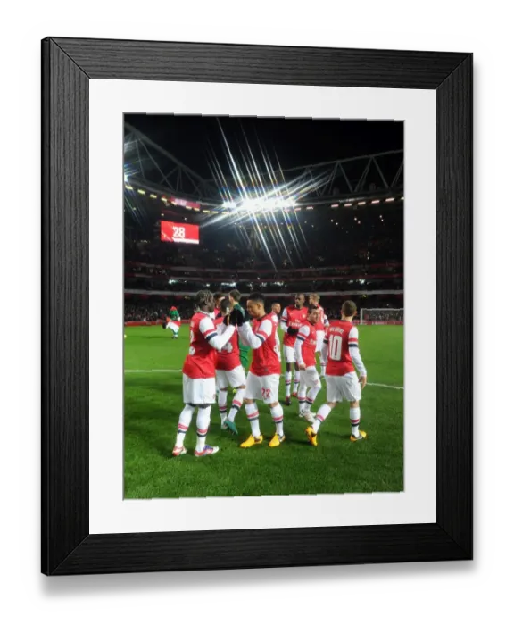 Framed Print : Arsenal players before the match. Arsenal 1: 0 Swansea City. FA Cup 3rd Round replay