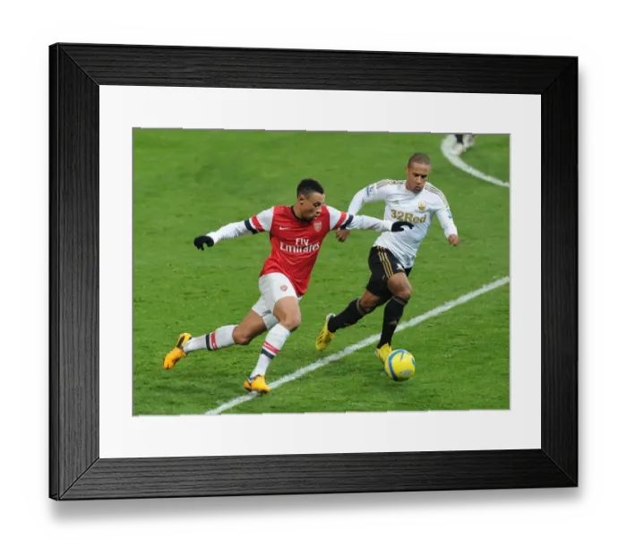 Framed Print : Arsenal's Coquelin Clashes with Swansea's Richards in FA Cup Third Round Replay Framed Print : Arsenal's Coquelin Clashes with Swansea's Richards in FA Cup Third Round Replay