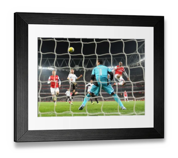 Framed Print : Arsenal's Abou Diaby Tries to Score Past Swansea's Michel Vorm in FA Cup Third Round Replay