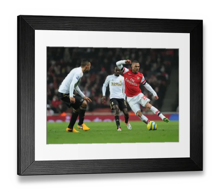 Framed Print : Arsenal's Kieran Gibbs Dashes Past Swansea's Defense in FA Cup Third Round Replay
