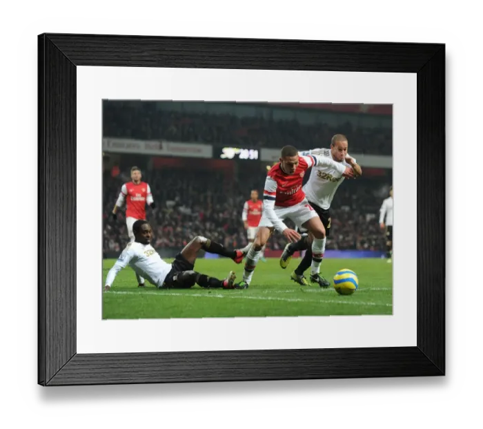 Framed Print : Arsenal's Kieran Gibbs Stands Firm Amid Swansea's Challenge in FA Cup Showdown Framed Print : Arsenal's Kieran Gibbs Stands Firm Amid Swansea's Challenge in FA Cup Showdown