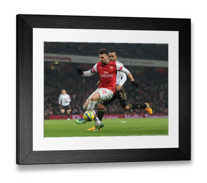 Framed Print : Arsenal's Olivier Giroud Clashes with Swansea's Kyle Bartley in FA Cup Third Round Replay Framed Print : Arsenal's Olivier Giroud Clashes with Swansea's Kyle Bartley in FA Cup Third Round Replay