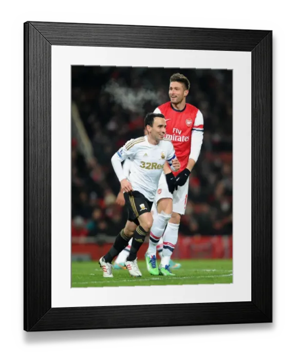 Framed Print : Olivier Giroud (Arsenal) Leon Britton (Swansea). Arsenal 1: 0 Swansea City. FA Cup 3rd Round replay