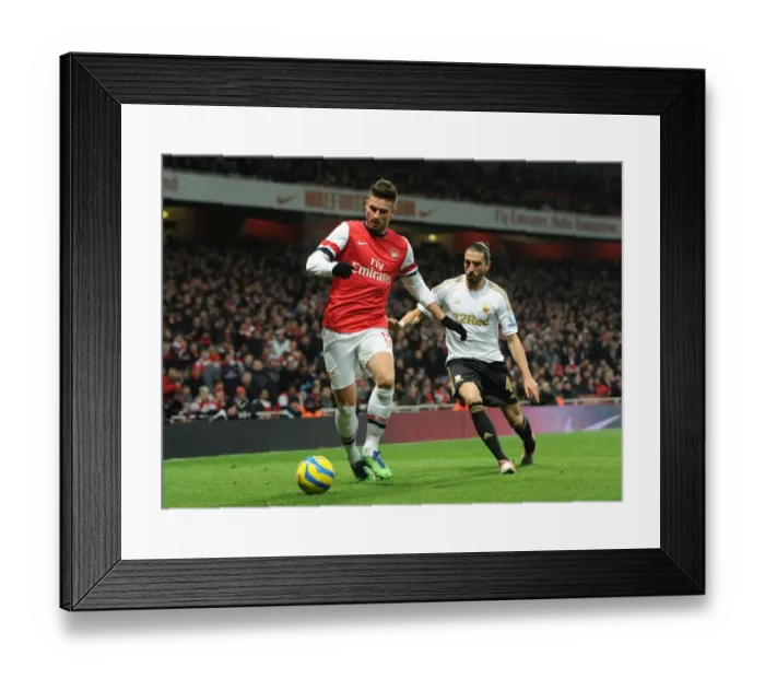 Framed Print : Arsenal's Olivier Giroud Fends Off Swansea's Chico Flores in FA Cup Third Round Replay Framed Print : Arsenal's Olivier Giroud Fends Off Swansea's Chico Flores in FA Cup Third Round Replay