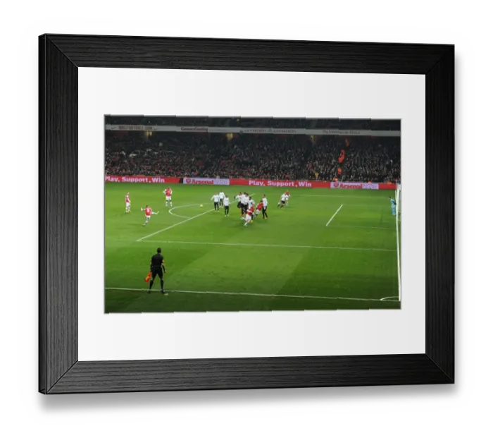 Framed Print : Arsenal's Thomas Vermaelen Takes Free-Kick in FA Cup Third Round Replay vs Swansea City Framed Print : Arsenal's Thomas Vermaelen Takes Free-Kick in FA Cup Third Round Replay vs Swansea City