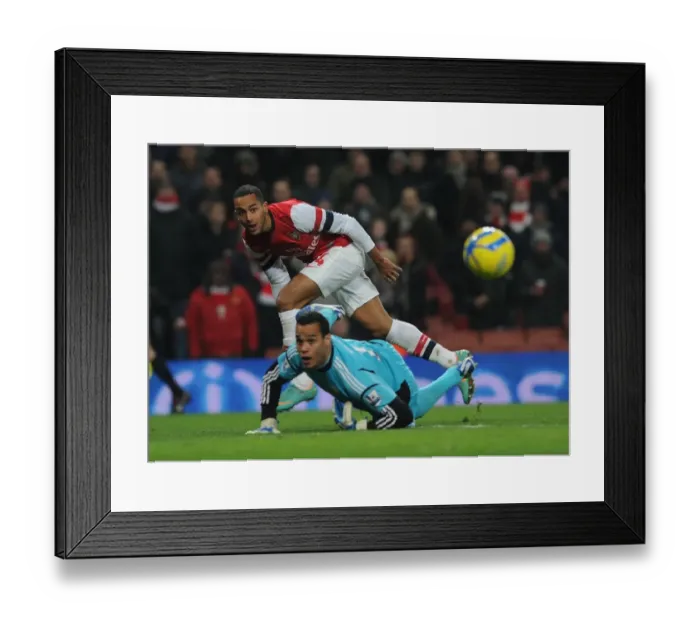 Framed Print : Theo Walcott vs Michel Vorm: A FA Cup Showdown at Arsenal's Emirates Stadium
