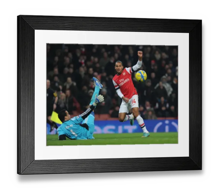 Framed Print : Theo Walcott vs Michel Vorm: A FA Cup Showdown at Arsenal's Emirates Stadium
