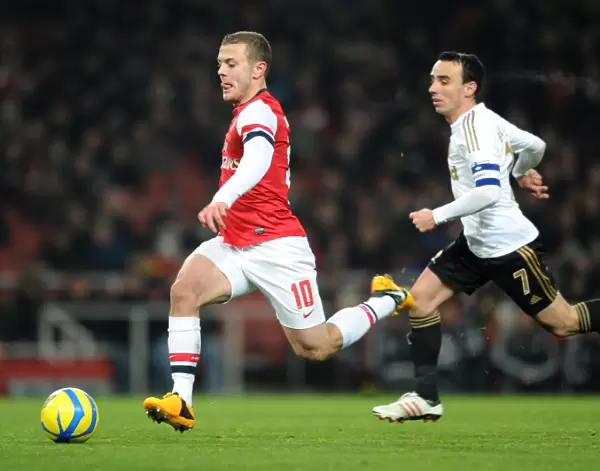 Jack Wilshere (Arsenal) Leon Britton (Swansea). Arsenal 1: 0 Swansea City. FA Cup 3rd Round replay