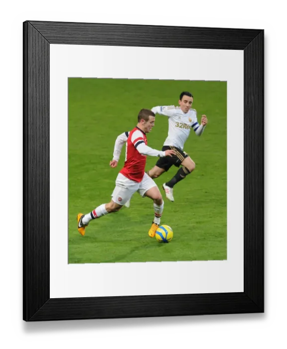 Framed Print : Jack Wilshere vs. Leon Britton: Battle at the Emirates - Arsenal v Swansea FA Cup Replay, 2013 Framed Print : Jack Wilshere vs. Leon Britton: Battle at the Emirates - Arsenal v Swansea FA Cup Replay, 2013