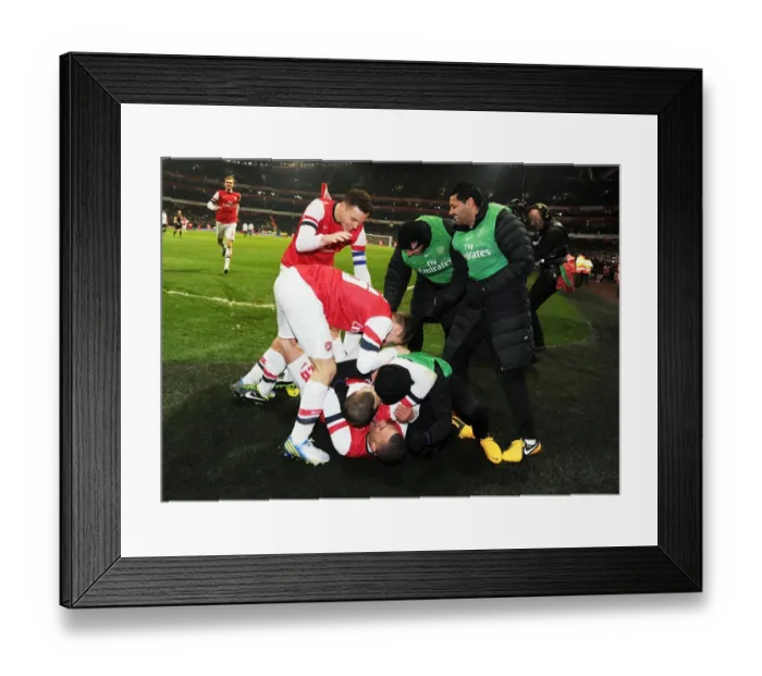 Framed Print : Arsenal's Jack Wilshere Scores in FA Cup Third Round Replay Against Swansea City Framed Print : Arsenal's Jack Wilshere Scores in FA Cup Third Round Replay Against Swansea City