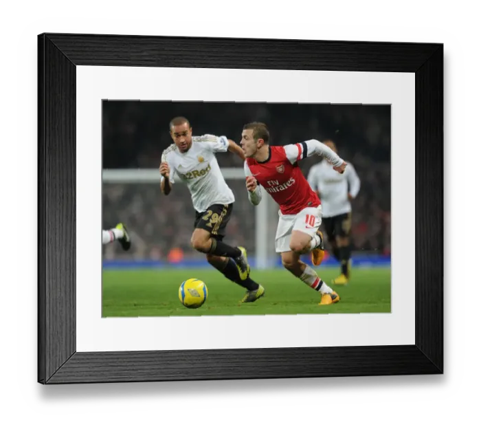 Framed Print : Arsenal's Jack Wilshere Clashes with Swansea's Ashley Richards in FA Cup Third Round Replay