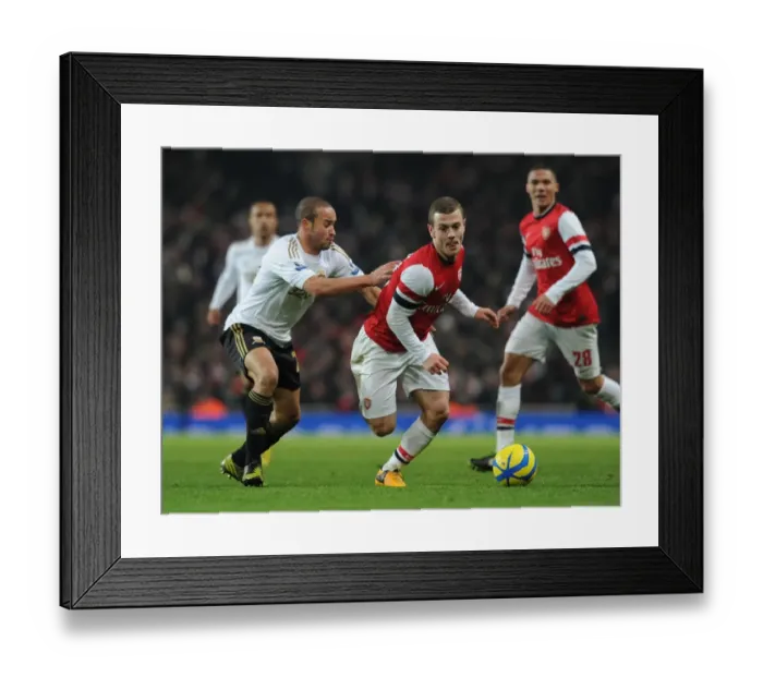 Framed Print : Showdown at the Emirates: Wilshere vs. Richards in FA Cup Third Round Replay